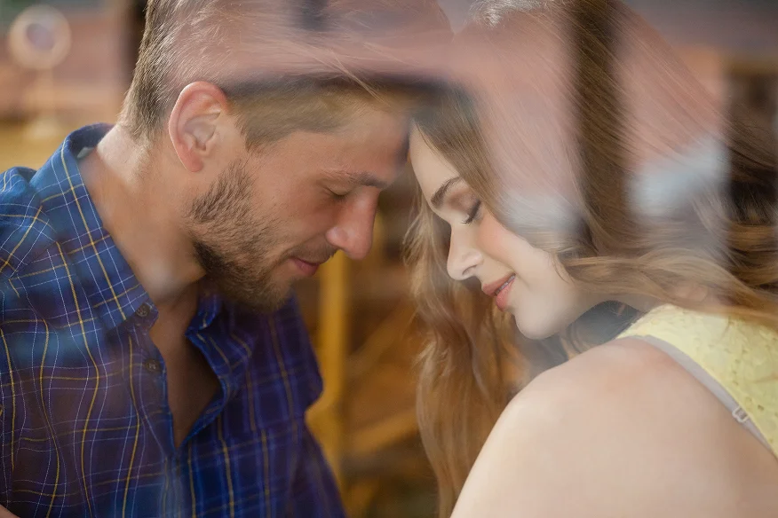 Couple touching foreheads in a moment of connection
